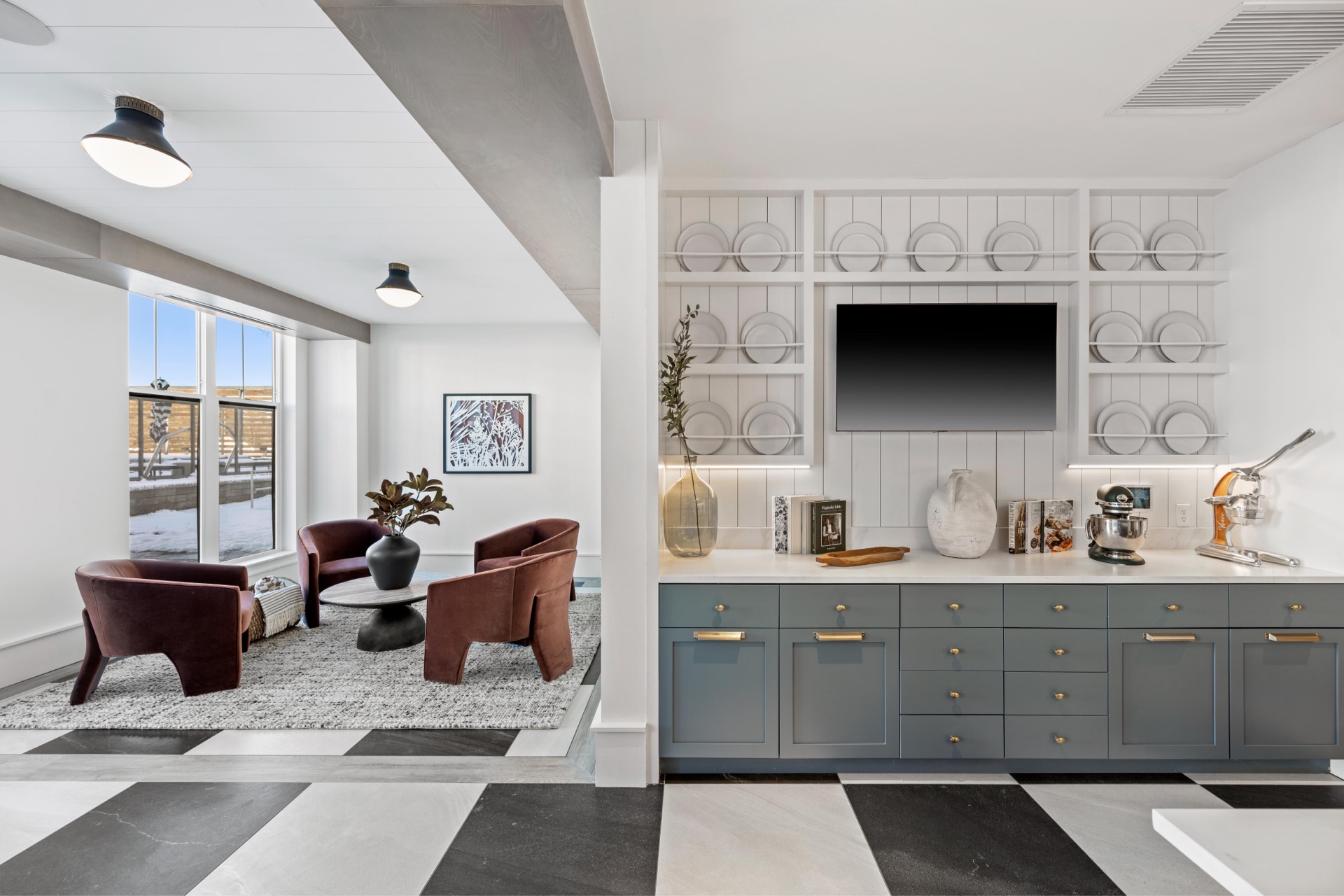 Chef's kitchen with charming nook and flat screen TV.